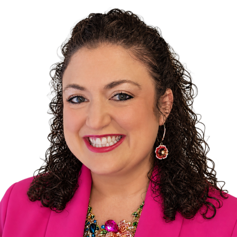 A woman wearing a gold sequined top and earrings is smiling for the camera.