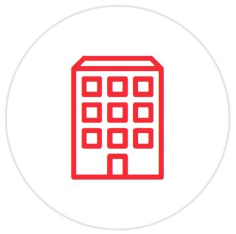 Un icono rojo y blanco de un edificio con cuadrados.