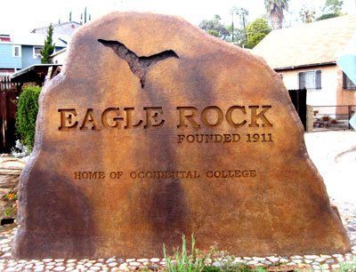 Brown stone sign with