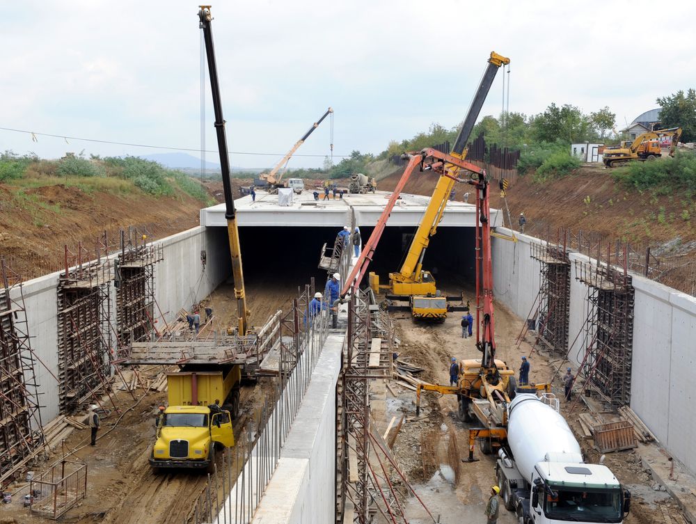 Construction Site: Cranes, Trucks, and Workers Building a Tunnel — ALI Civil Pty Ltd in South Nowra, NSW