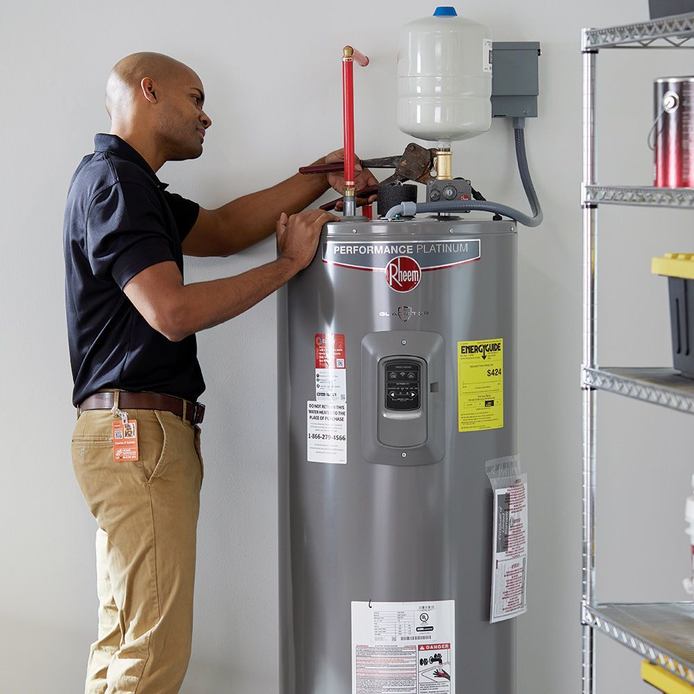 Plumber Today technician installing a residential water heater
