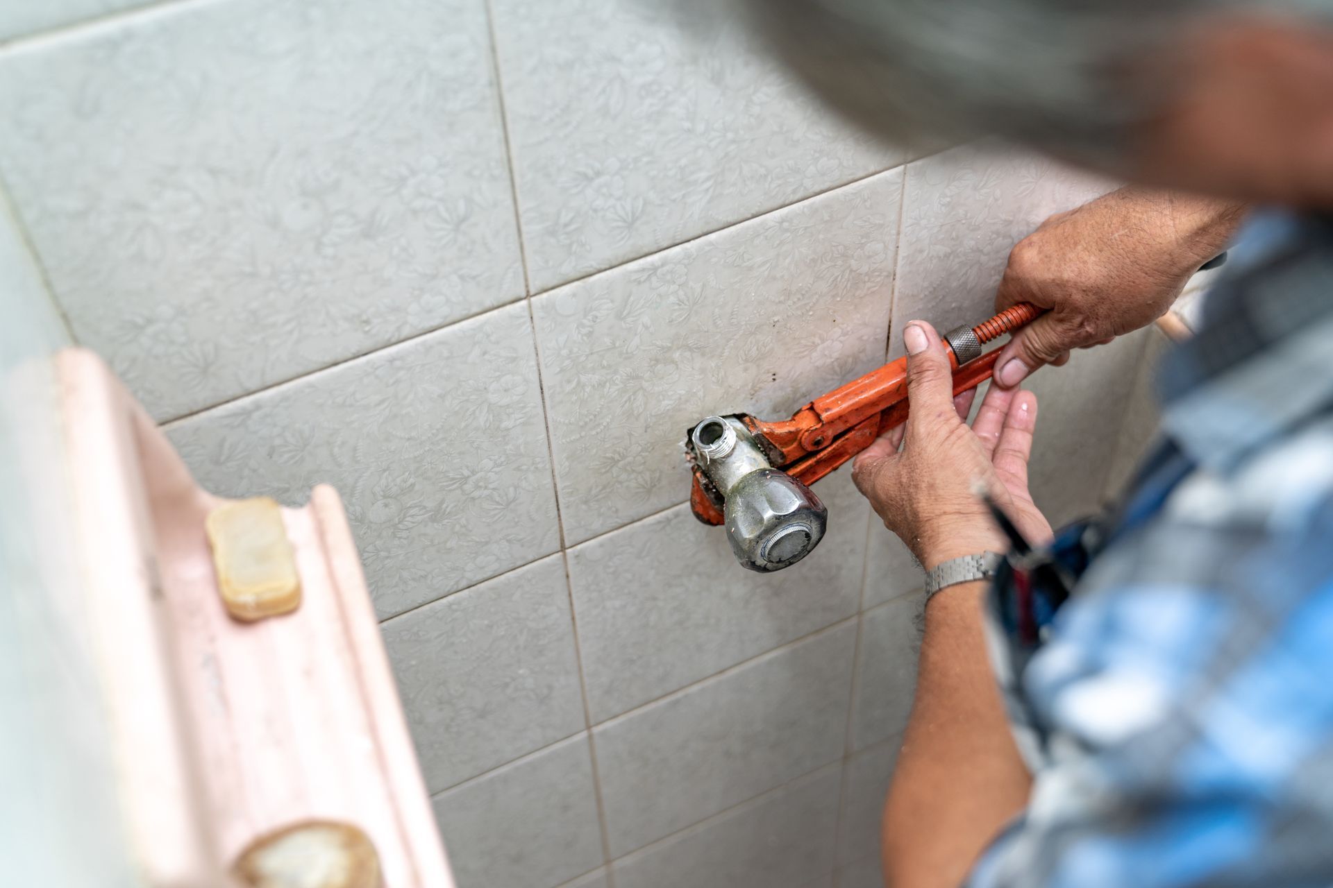 Plumber Today technician installing bathroom plumbing pipes