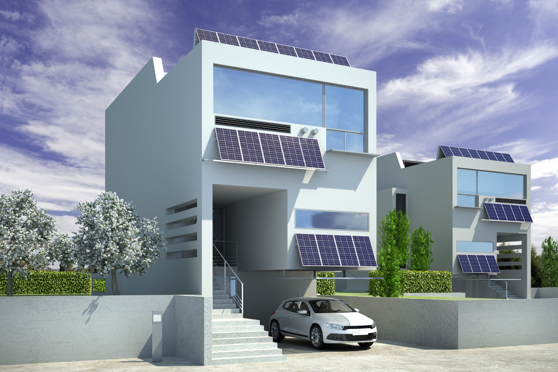 A white car is parked in front of a white building