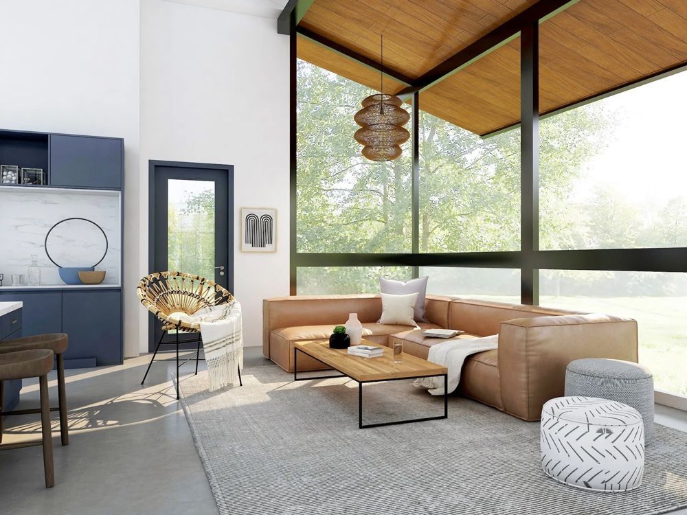 A living room with a couch , coffee table , chairs and a large window.