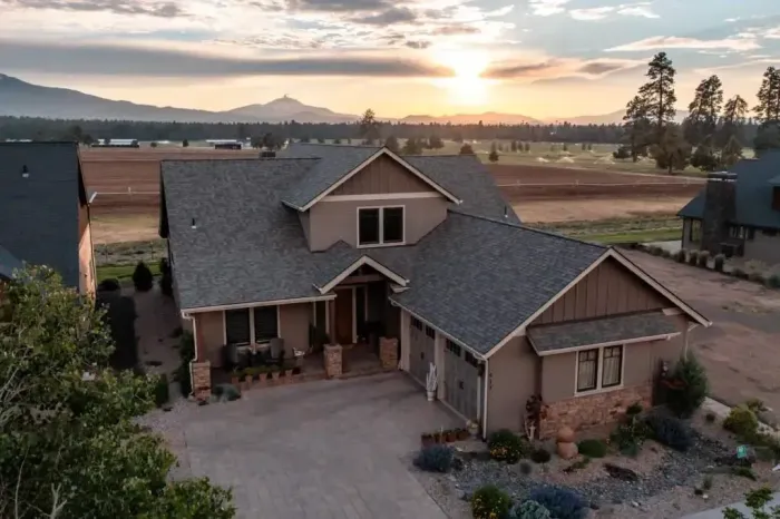 Beautiful Sunset Behind A Custom Built Home in Bend Oregon Beautiful Sunset Behind A Custom Built Home in Bend Oregon