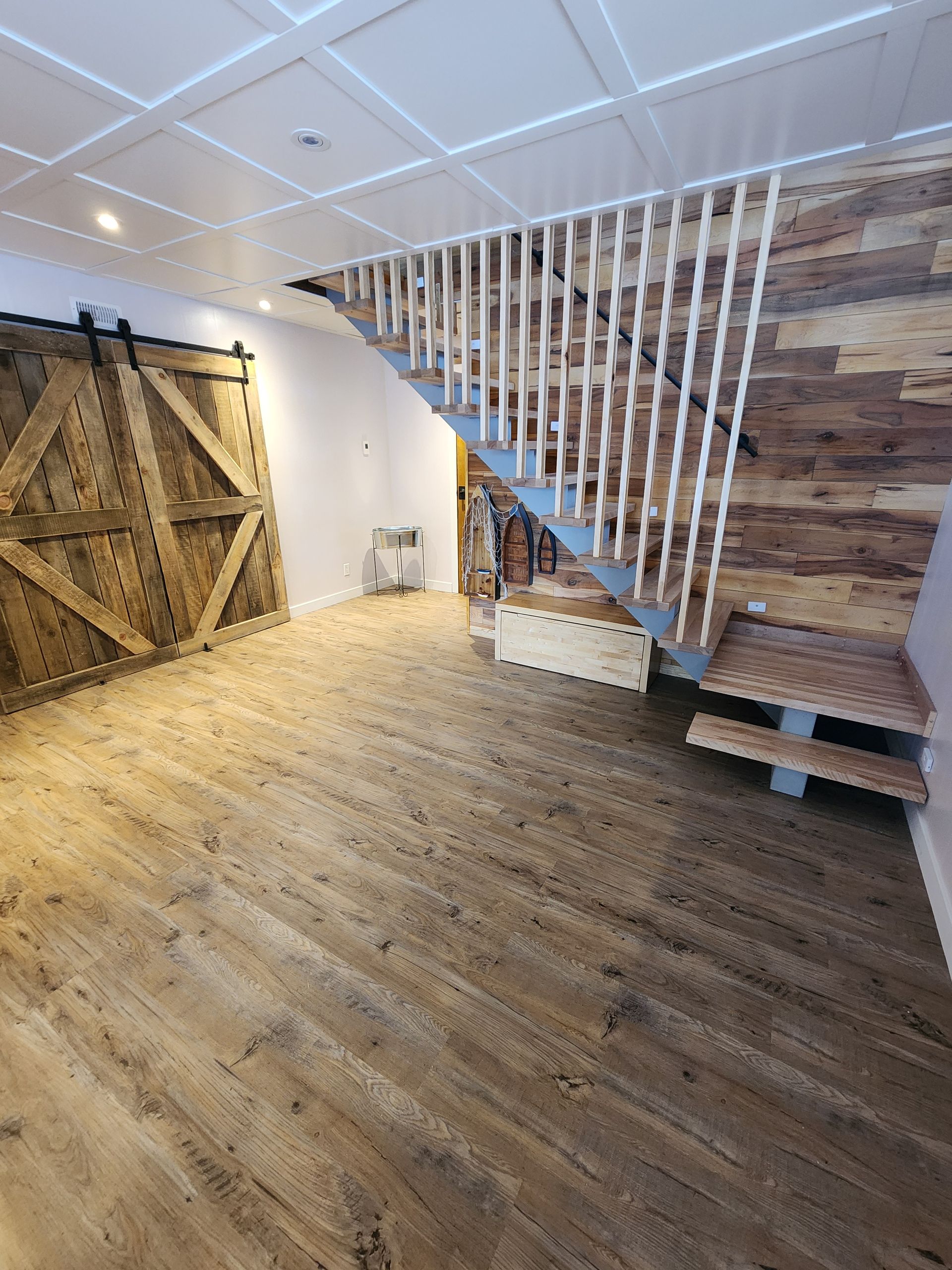 There is a staircase in the corner of the room.