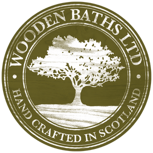 A logo for wooden baths ltd hand crafted in scotland