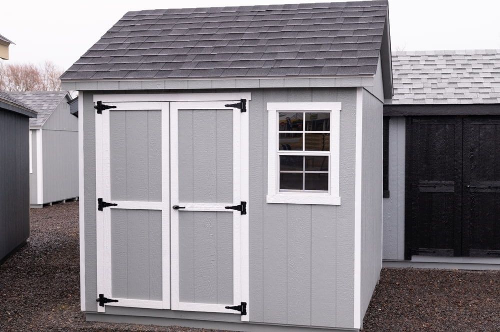 Gray Shed With White-trimmed Double Doors, a Window, and Gray Roof — ShedBoss in Atherton, QLD