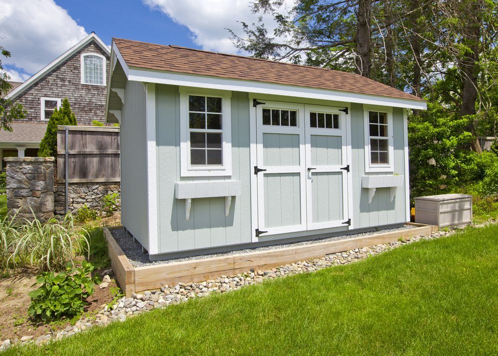 Light Blue Shed With White Trim, Brown Roof — ShedBoss in Atherton, QLD