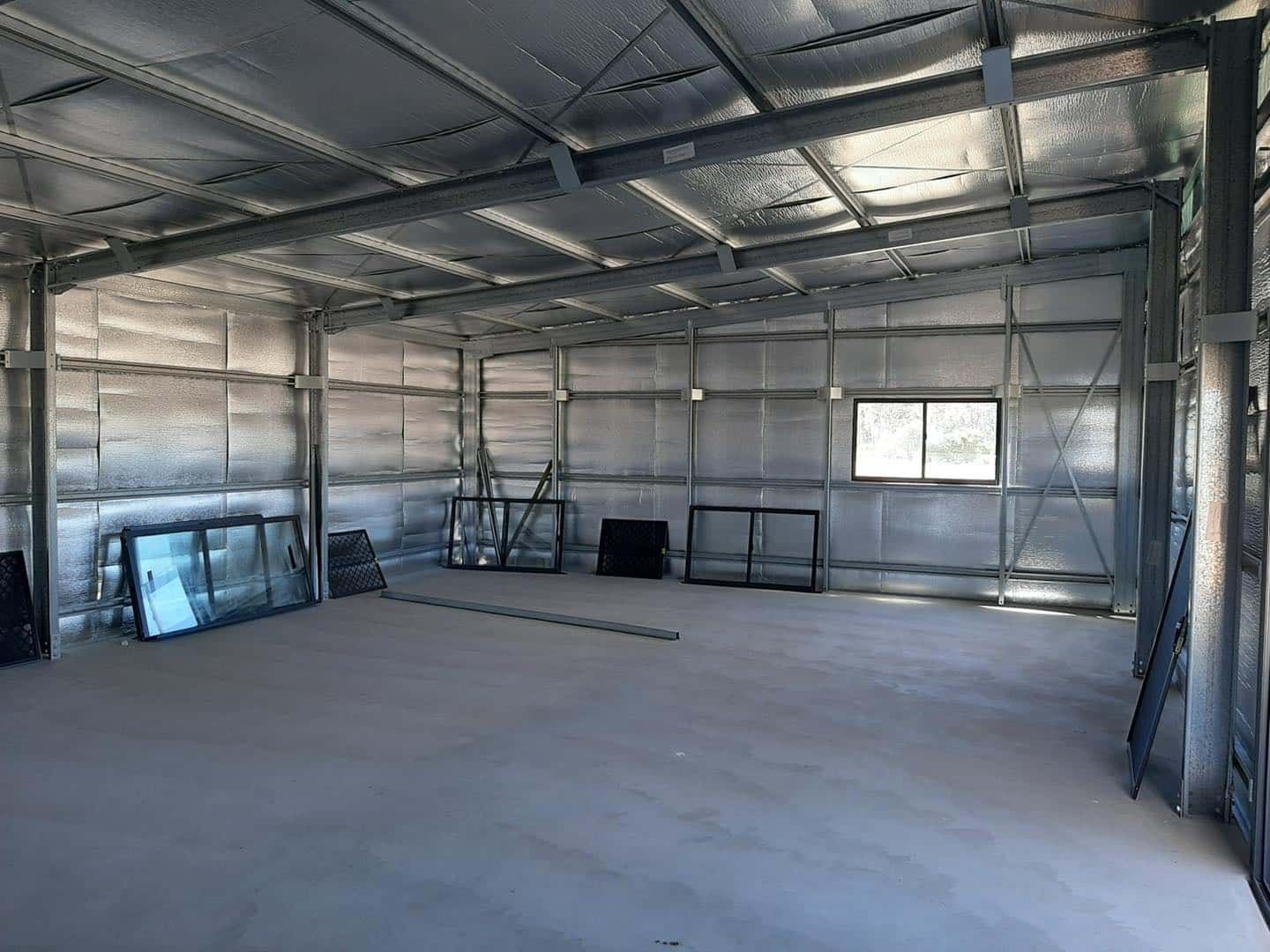 Empty Metal-framed Building Interior With Insulated Walls — ShedBoss in Atherton, QLD