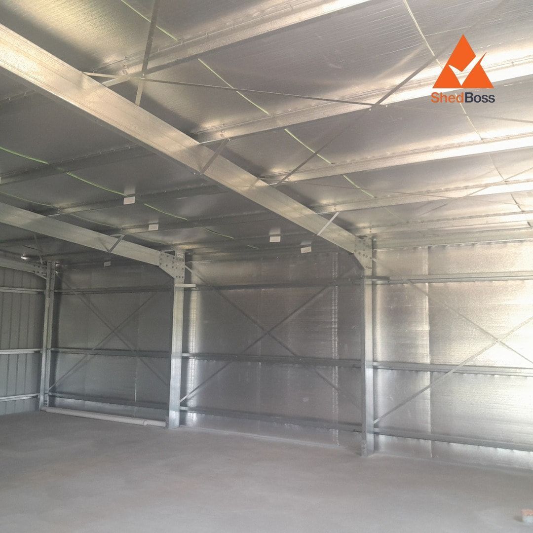 Interior of a Metal Industrial Building With Gray Walls and Ceiling — ShedBoss in Atherton, QLD