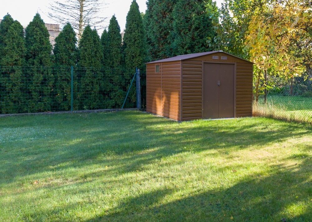 Brown Shed in a Grassy Backyard — ShedBoss in Mareeba, QLD