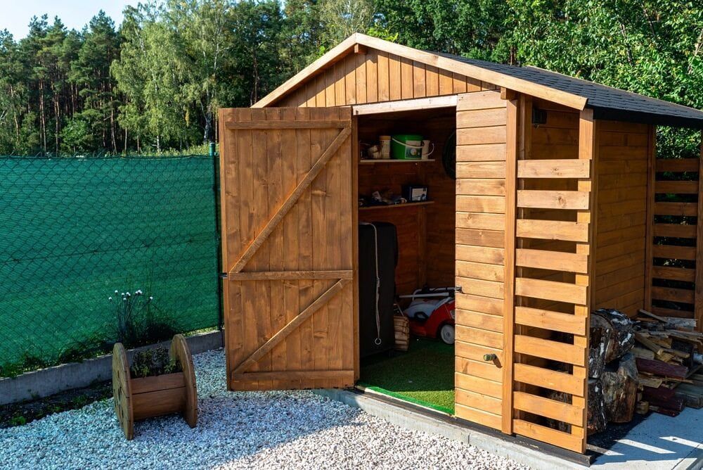 Wooden Garden Shed With Open Doors, Green Floor, and Contents Visible — ShedBoss in Malanda, QLD 