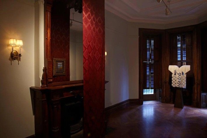 GALLERY ONE left to right - [reflected in fireplace mantel mirror] René MAGRITTE, [floor] Elizabeth TURK