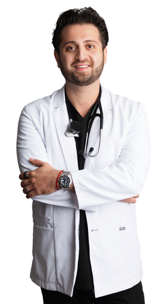 A man in a lab coat with a stethoscope around his neck is standing with his arms crossed. | You Health
