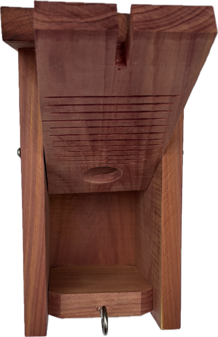 A wooden shelf with a hole in the middle on a white background.