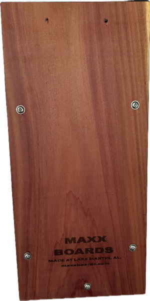 The back of a wooden box that says maxx boards on it.