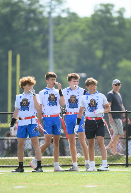Boys Flag Football, team huddle | T3 Turf Legends Flag Football.