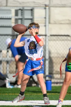 Boy, football throw | T3 Turf Legends Flag Football.