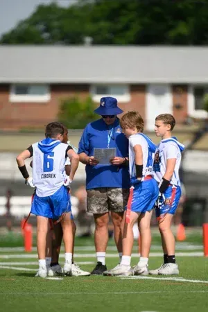 Boys, huddle | T3 Turf Legends Flag Football.