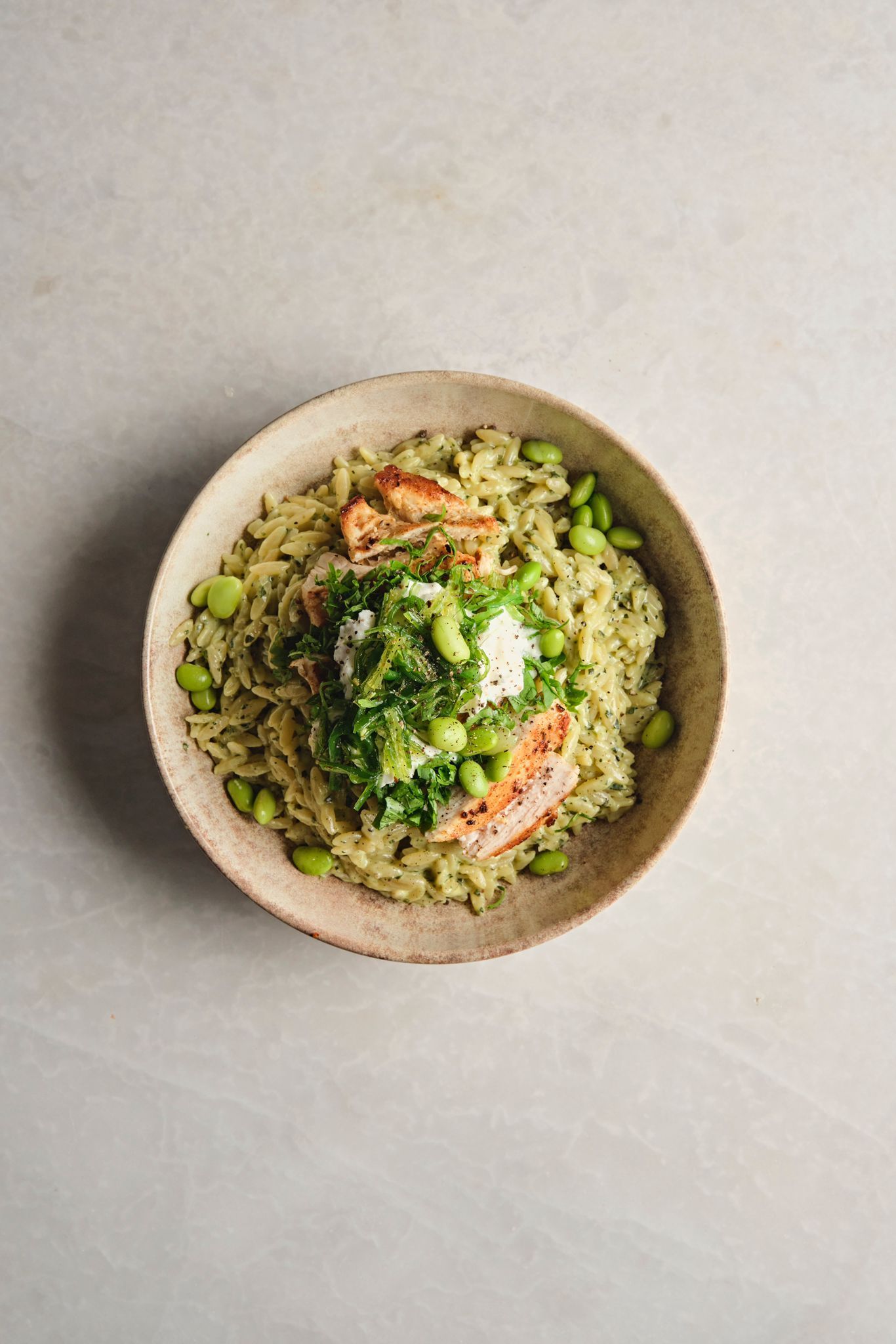 <b>chicken with orzo</b><br>pesto orzo, stracciatella | (680 gr.)<br>820 kcal