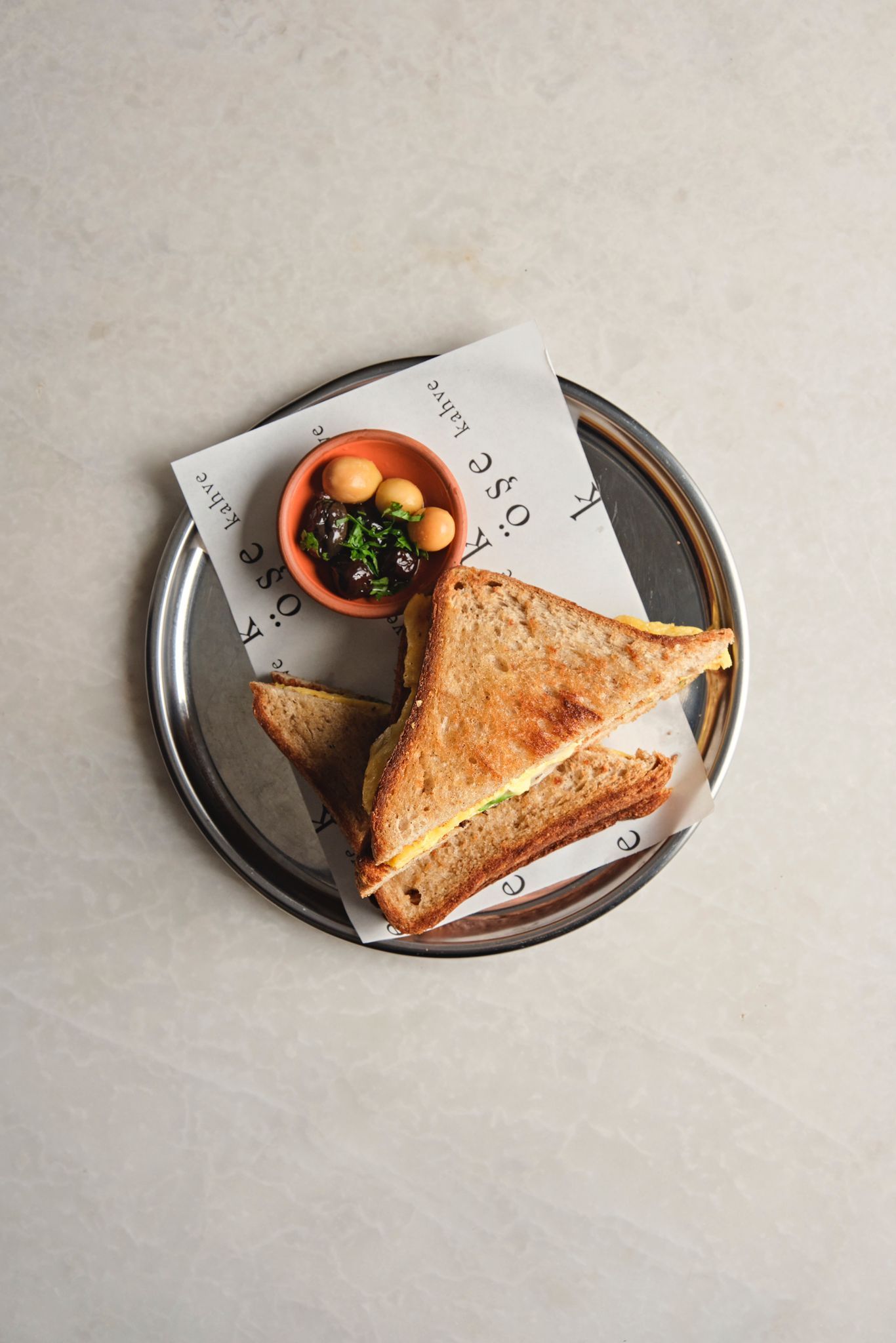 <b>omelet toast w/ avocado</b><br>whole grain bread, avocado, cheese, egg | (350 gr.)