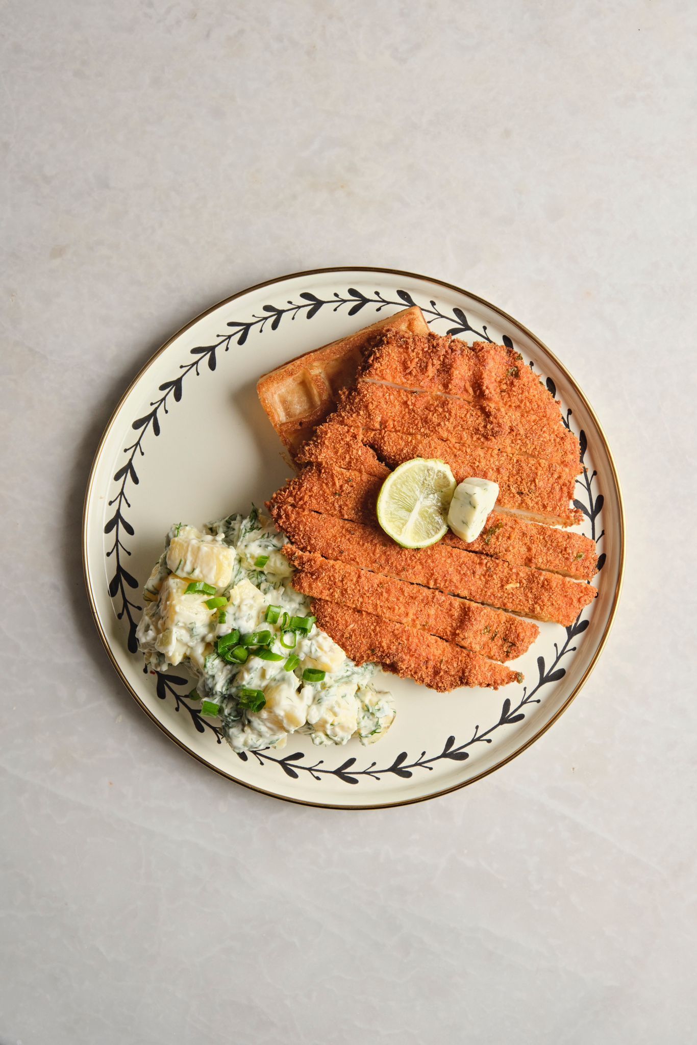 <b>crispy schnitzel</b><br>chicken schnitzel, with austrian potato salad | (420 gr.)<br>1040 kcal
