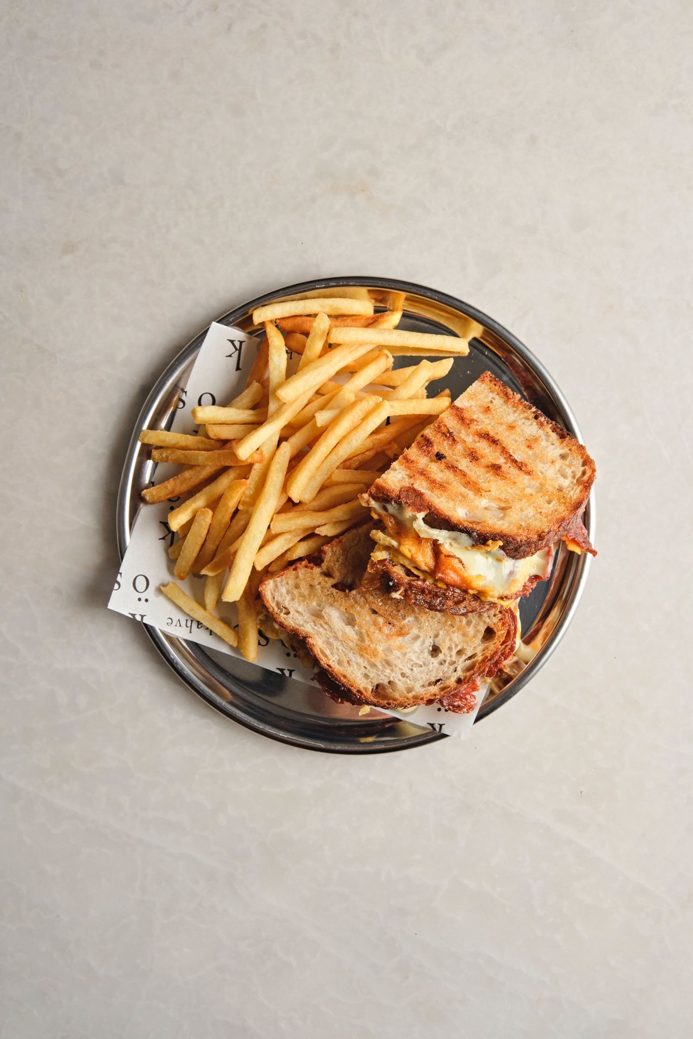 <b>artisan toast</b><br>“sucuk”, grilled cheese, egg, oregano, “pul biber” tomato paste, french fries<br>| (480 gr.)
