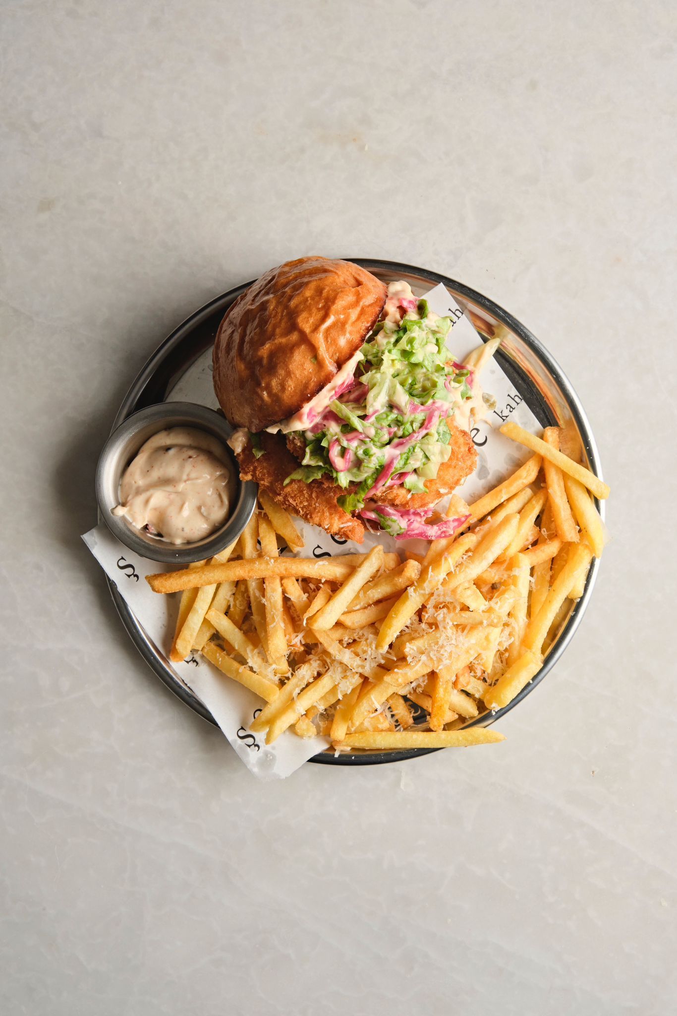 <b>chicken caesars burger</b><br>lettuce, sauerekraut, caesars sauce, with french fries | (425 gr.)<br>1080 kcal