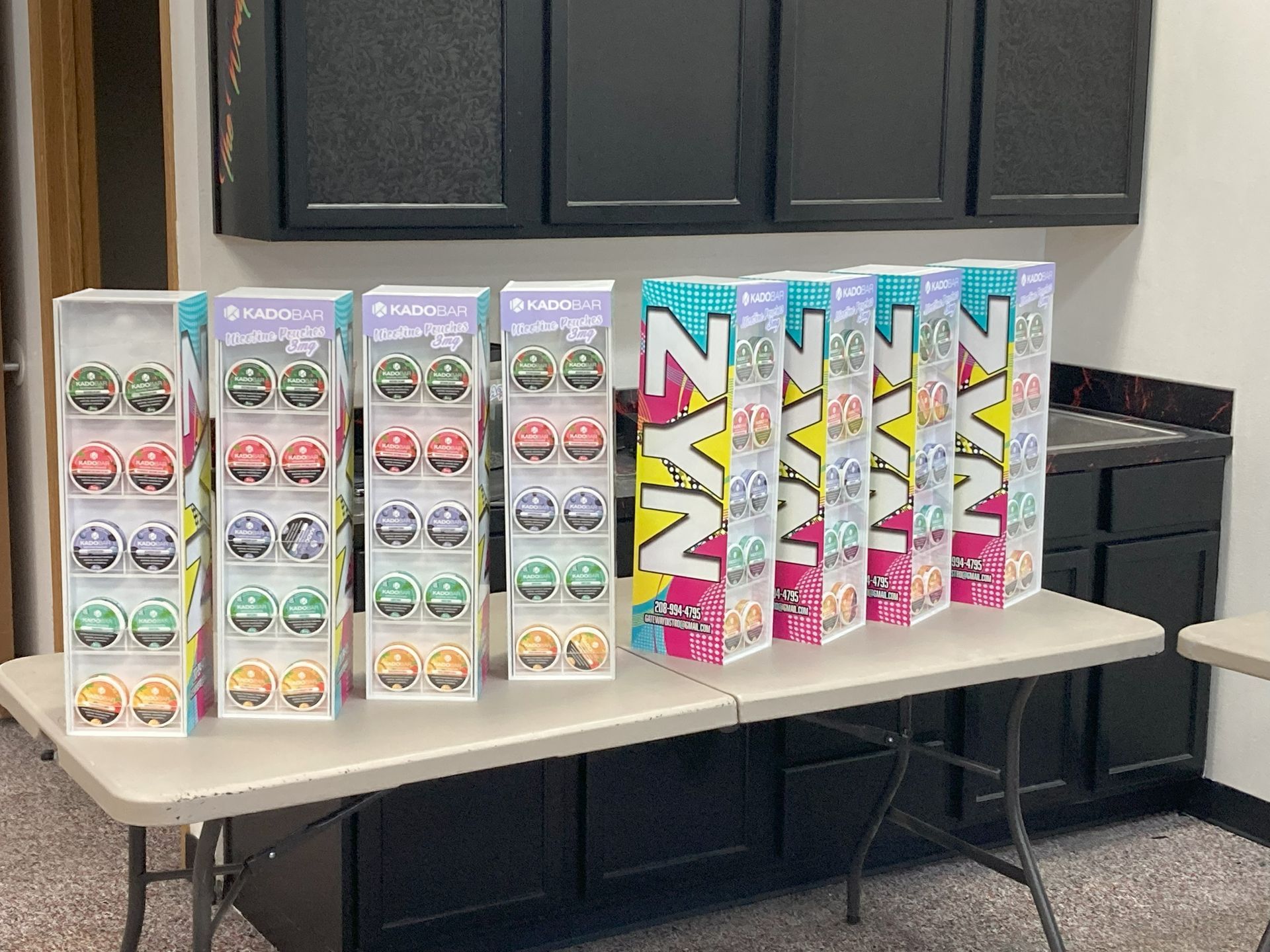 A row of boxes sitting on top of a table.