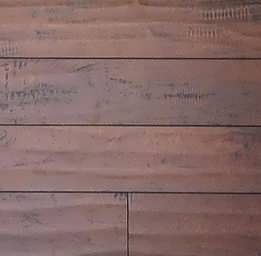 It is a close up of a wooden floor.