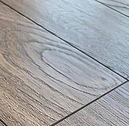 It is a close up of a wooden floor.