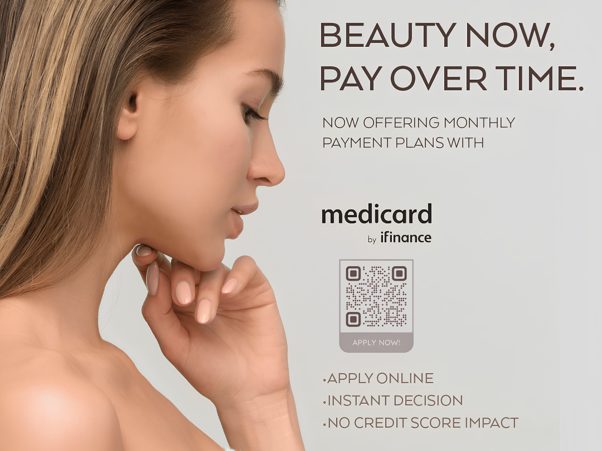 A woman 's face is on a poster that says beauty now pay over time.