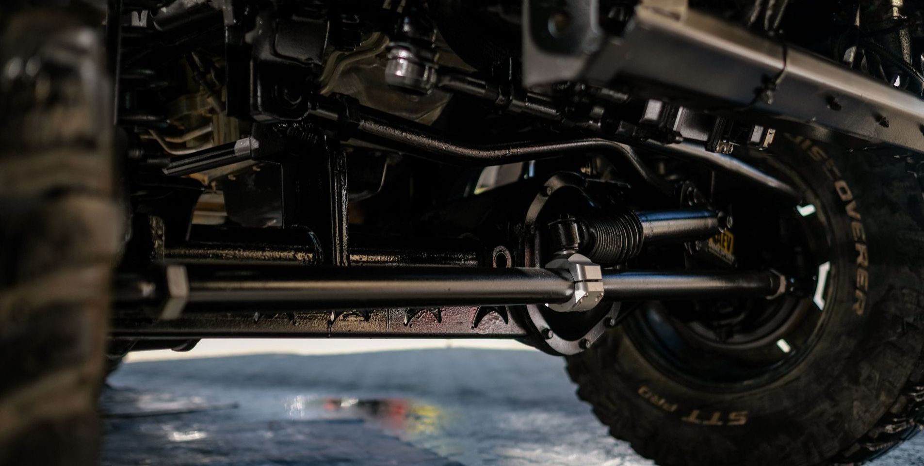 A close up of the front suspension of a jeep.Treated by Anthony Anti-Corrosion Coatings.