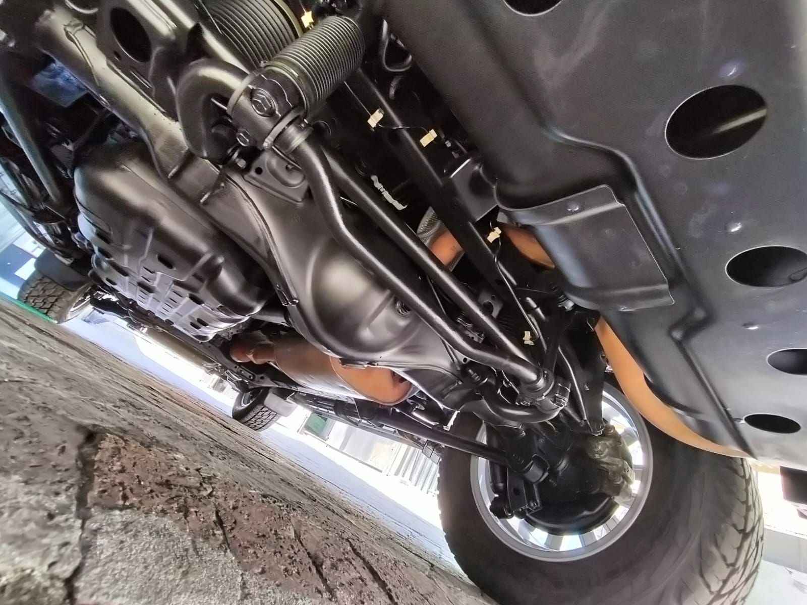 A close up of the underside of a car. Treated by Anthony Anti-Corrosion Coatings.