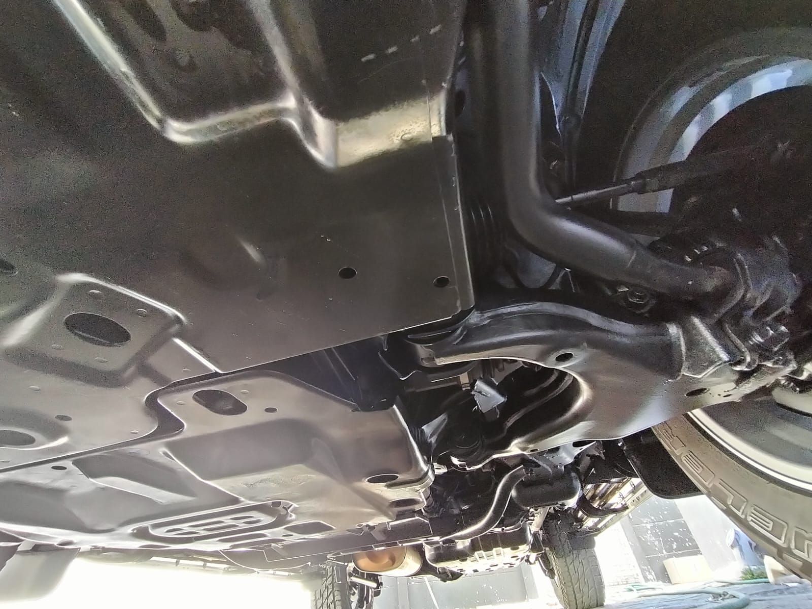 A close up of the underside of a car. Treated by Anthony Anti-Corrosion Coatings.