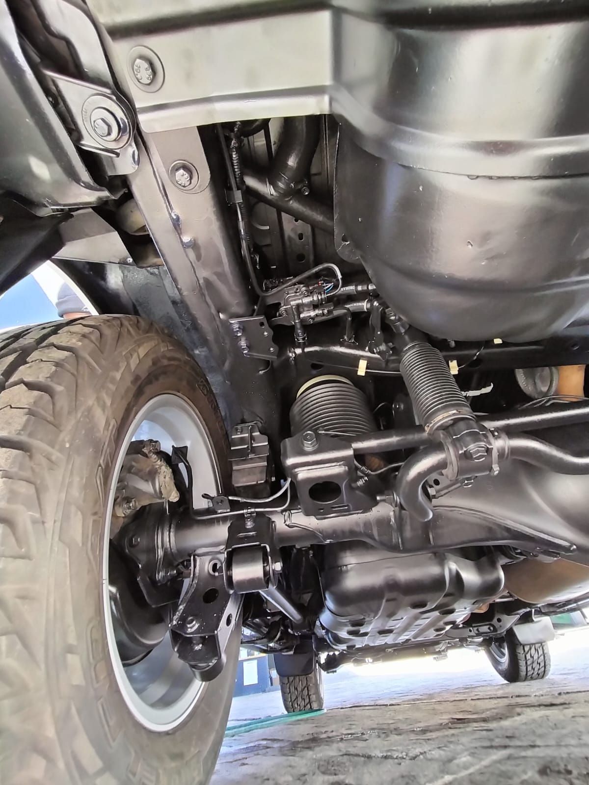 A close up of the underside of a car. Treated by Anthony Anti-Corrosion Coatings.
