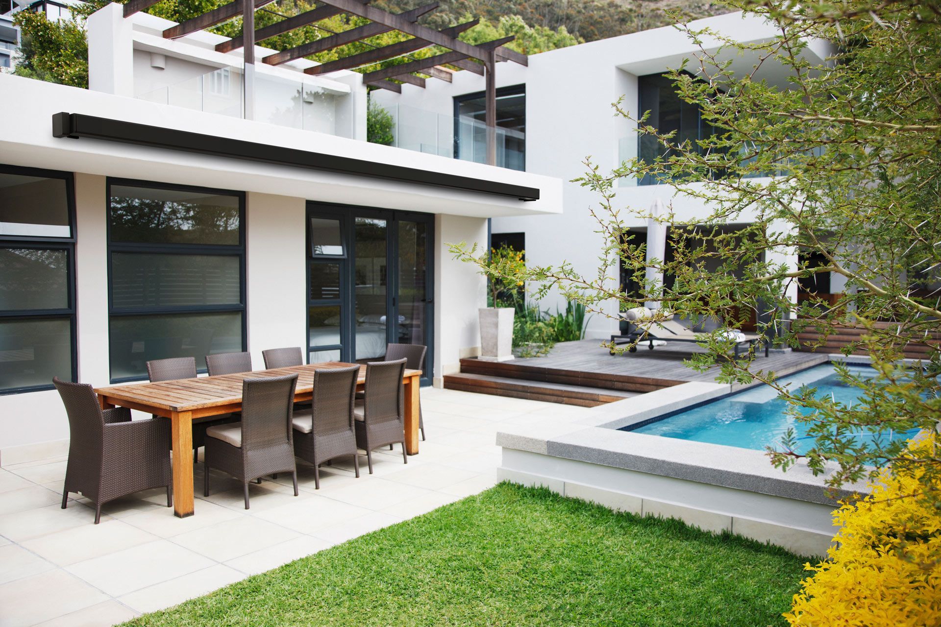 A close-up of a motorized retractable awning, showing the durable fabric and sleek design.