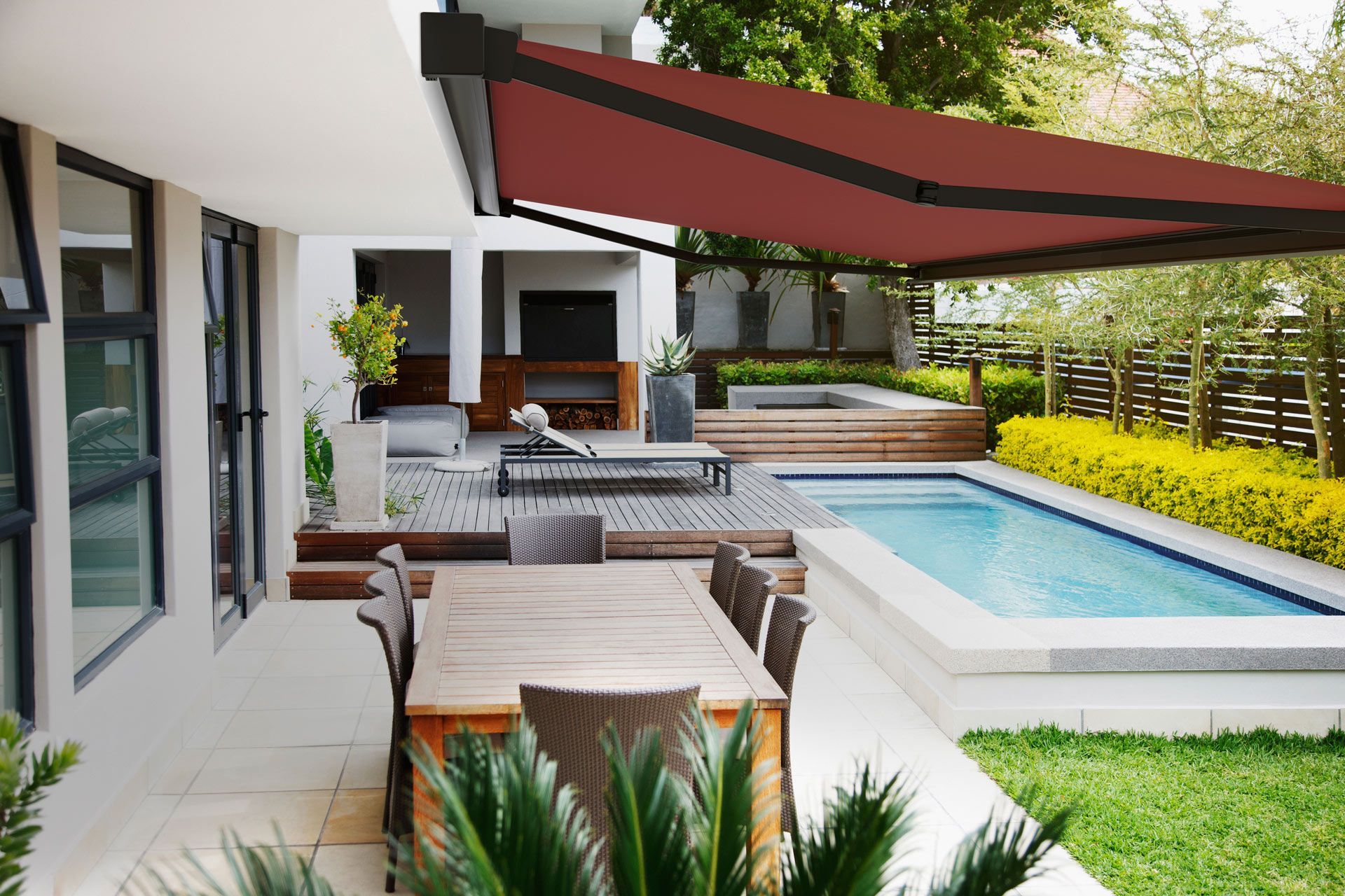 A close-up of a motorized retractable awning, showing the durable fabric and sleek design.