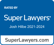 A blue sign that says `` super lawyers '' on it.