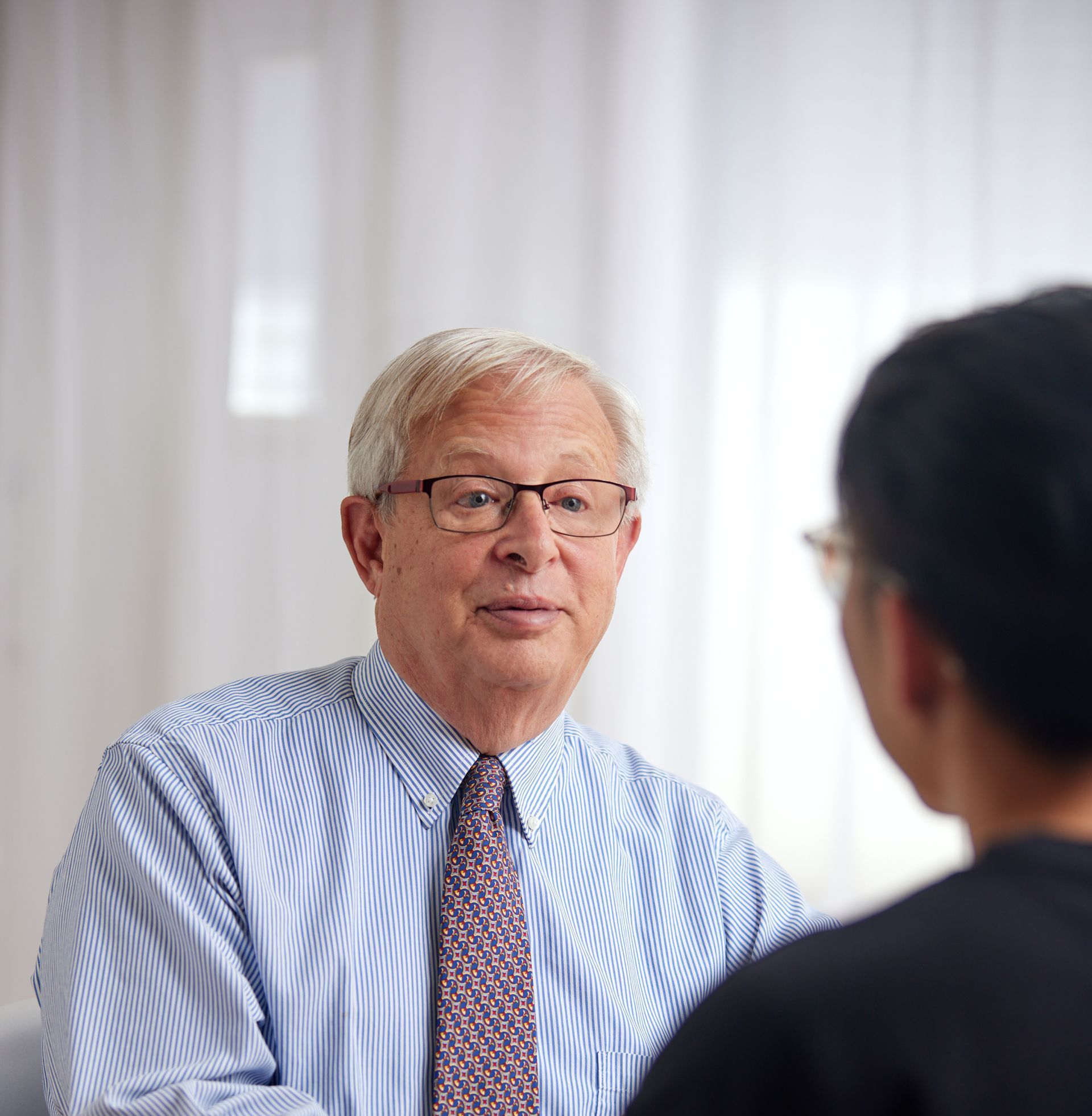 Brian A. Ripley, Business and Real Estate Attorney With Client