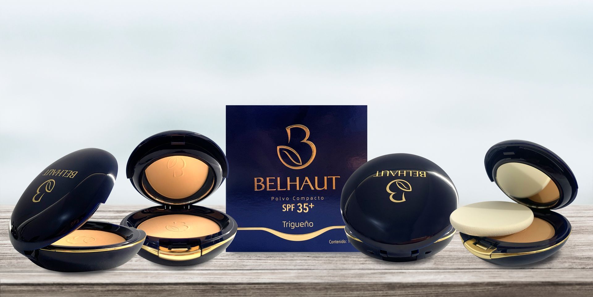 a box of belhaut polvo compacto sits on a wooden table