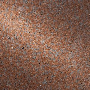 Close-up of a mottled rust-brown and gray textured surface