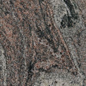 Close-up of a gray and pink speckled stone surface with diagonal dark streaks