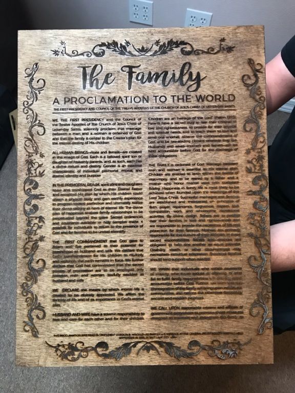 Handheld sepia-toned flyer titled “The Tumbly” with dense text and ornate border design