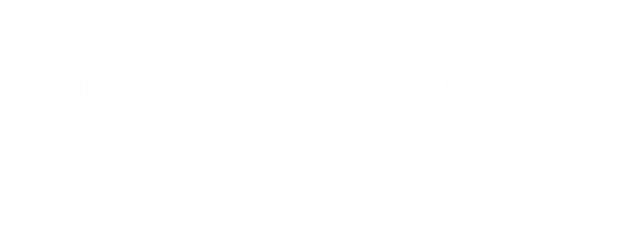 McDougal Caldwell funeral home logo with sunburst and text, white