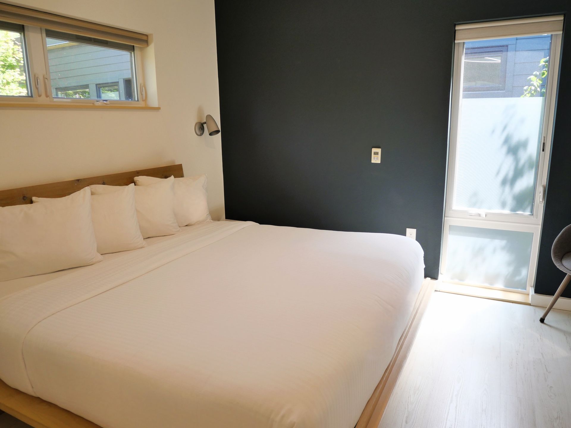 The Lodges on Vashon interior bedroom with king bed.