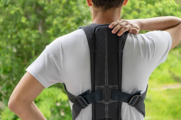 Back support brace for posture and lower back pain relief during physiotherapy