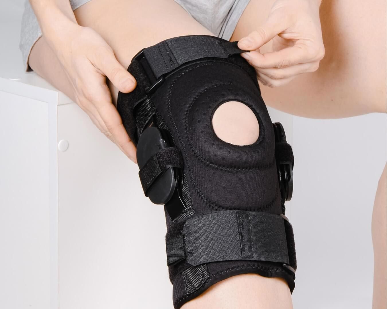 Knee brace support used during physiotherapy rehabilitation for knee pain