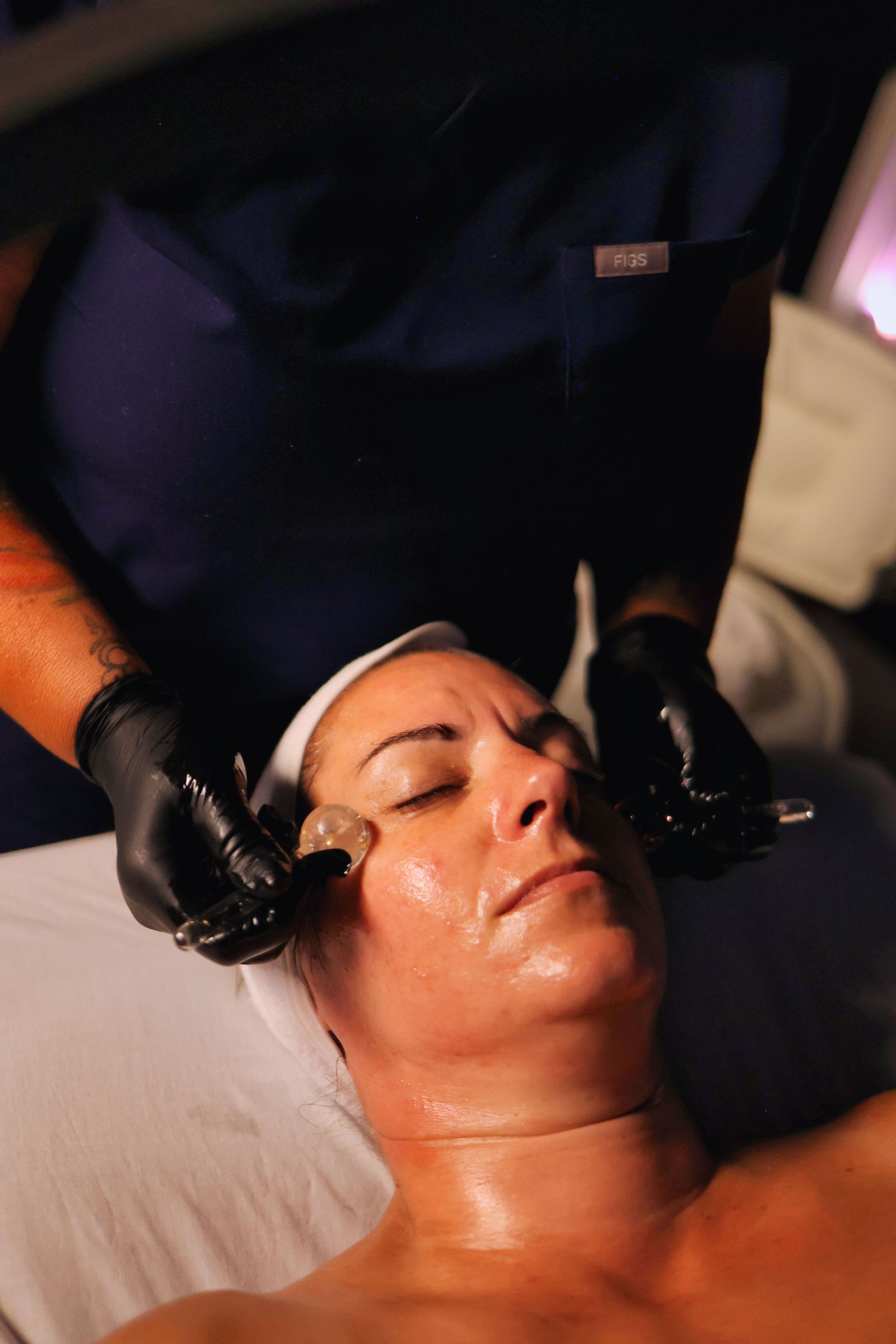 Relaxing facial massage during a signature facial at Hans Esthetics in Plainfield, IL